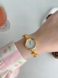 Shein - 1Pc Round Seashell Dial Bracelet Watch For Women, Light Gold Bracelet Strap Watch With Bowknot Decoration, Suitable For Party/ Everyday Wear/ Holiday Gift