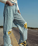 Weave Wardrobe - Smiley Patched Random Wash Denim Jeans | El Denim Vol. 1: Highway | Weave Wardrobe
