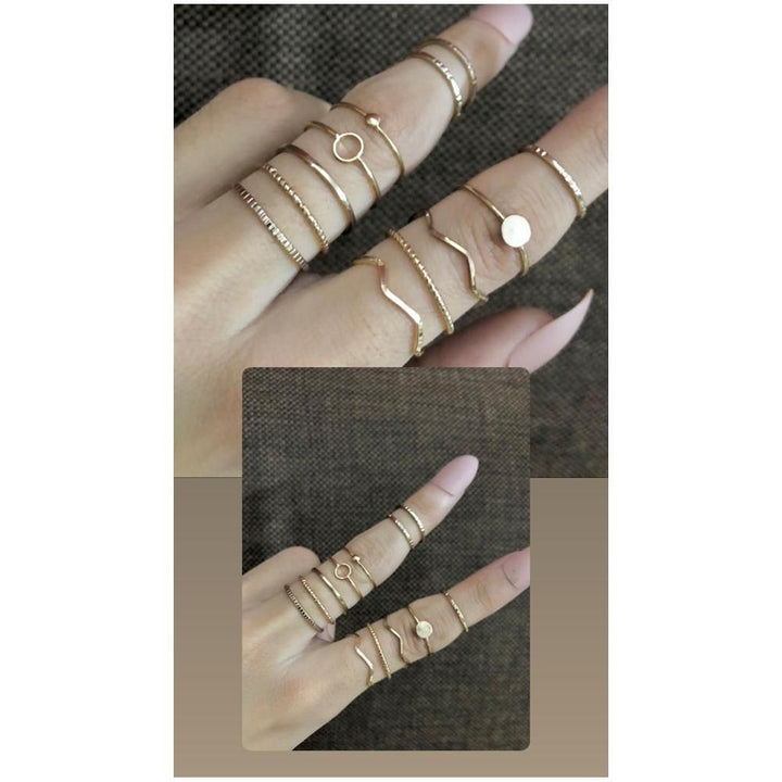 Jewels By Noor- A set of 12 gold rings by H&M