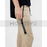Montivo Bsk beige jogging trousers with side stripe