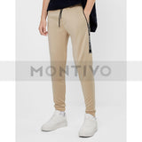 Montivo Bsk beige jogging trousers with side stripe