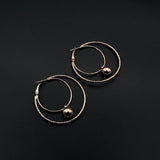 Endless Fashion- Golden Circle Double Hoop Earrings by Endless Fashion priced at #price# | Bagallery Deals