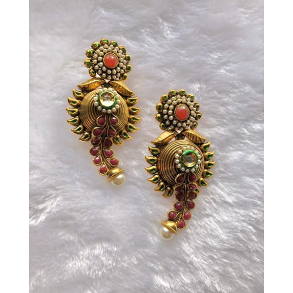 Jewels By Noor- desingner wear leaf earrings with ruby and emerald stone